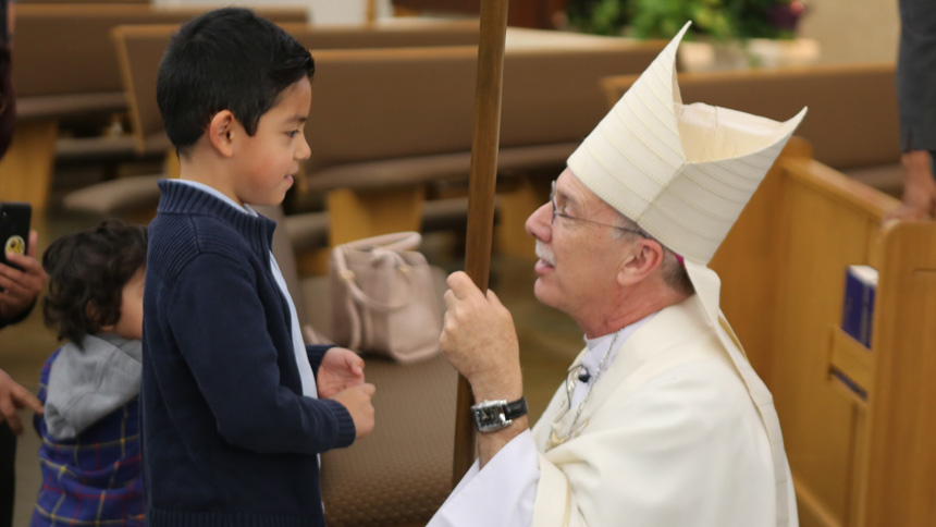 Bishop Luis Rafael Zarama greets people after Mass.